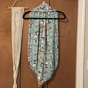 Reversible stretchy loop scarf with vintage camera print.